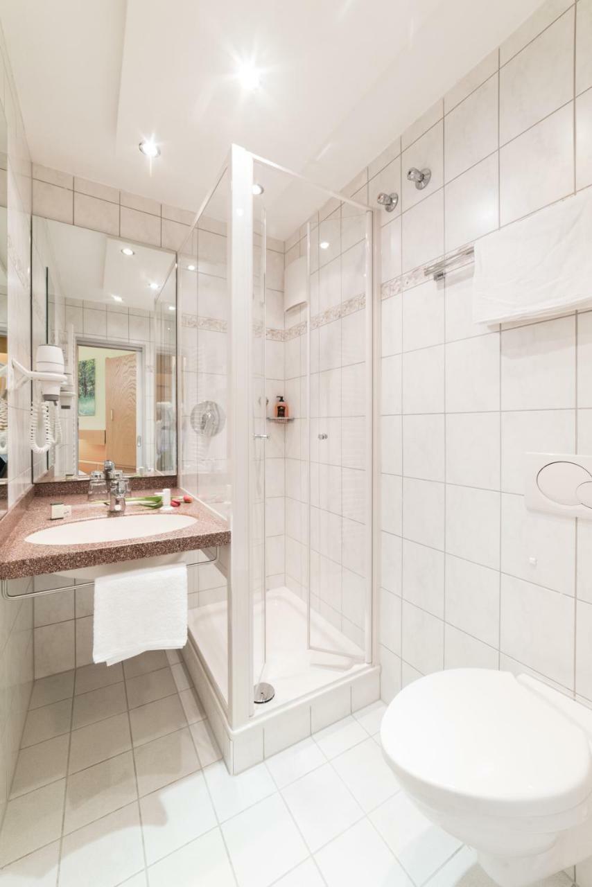 Hotel Garni Vier Jahreszeiten บาดฟึสซิง ภายนอก รูปภาพ
